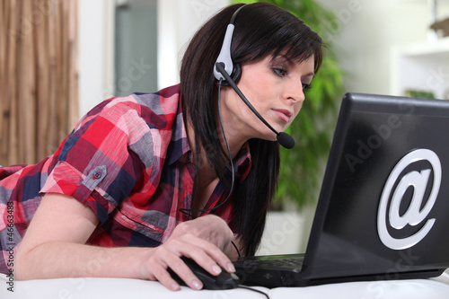 Photo: Woman using VOIP Woman using VOIP