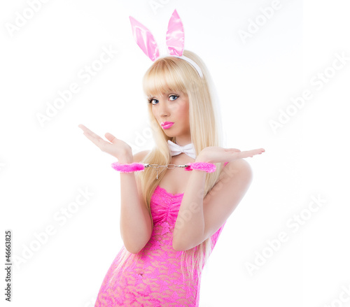 Photo: Pretty woman in bunny ears with handcuffs Pretty woman in bunny ears with handcuffs