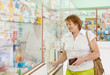  woman buys drugs at the pharmacy