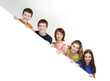 A group of happy teenagers holding a white banner