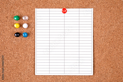 Photo: Cork bulletin board with notes. Cork bulletin board with notes.