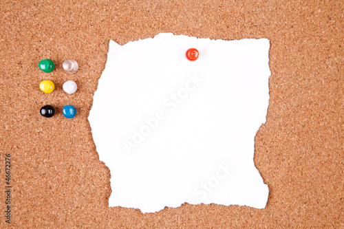 Photo: Cork bulletin board with notes. Cork bulletin board with notes.