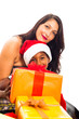 Beautiful woman with boy and Christmas gifts