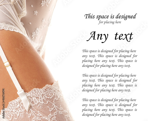 Photo: Close-up image of a young woman's leg in white stockings Close-up image of a young woman's leg in white stockings