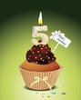 Cupcake mit Geburtstagskerze die Zahl 5