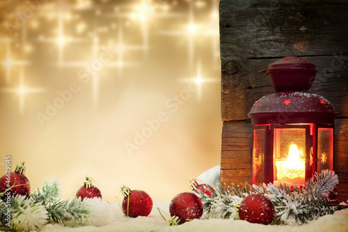 Photo: Christmas baubles with lantern and stars background concept Christmas baubles with lantern and stars background concept
