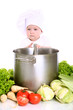 Baby cook with pan and vegetables on a white
