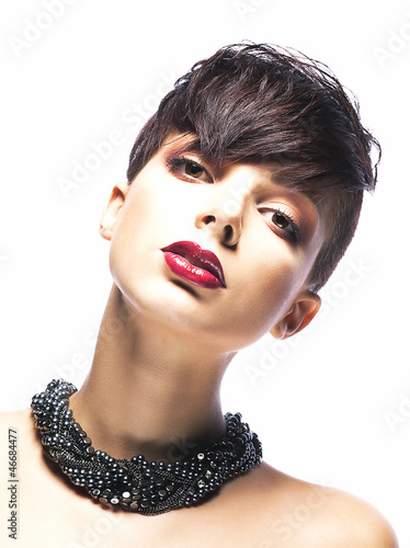Photo: Portrait of glamorous young woman - stylish fashion model Portrait of glamorous young woman - stylish fashion model