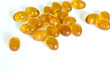 Rice bran oil pills on white background