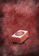 Tile of mahjong on grunge background