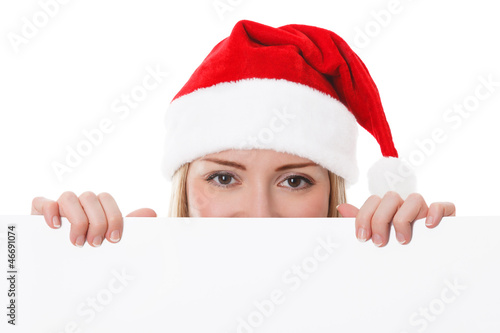 Photo: Female santa holding a christmas white card Female santa holding a christmas white card