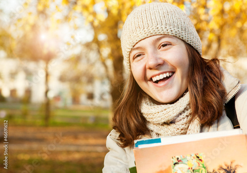 Photo: Happy smiling teenage girl portrait Happy smiling teenage girl portrait