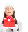 Beautiful young Christmas girl with gift.