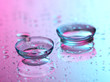 contact lenses, on pink-blue background