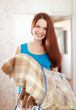 Happy woman with new plaid