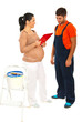 Pregnant woman converse with workman
