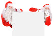 Two Santa Claus holding a blank sign