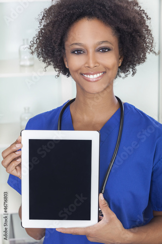 Photo: African American Female Doctor With Tablet Computer African American Female Doctor With Tablet Computer