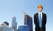 Businessman standing on the construction site