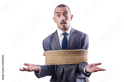 Photo: Businessman tied up with rope Businessman tied up with rope