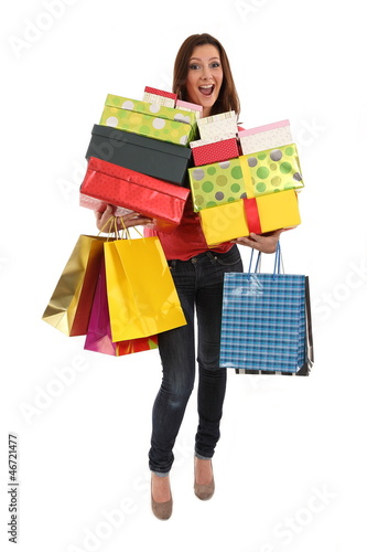 Photo: Happy woman with shopping bags and gifts Happy woman with shopping bags and gifts