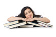 Tired student with textbooks on white