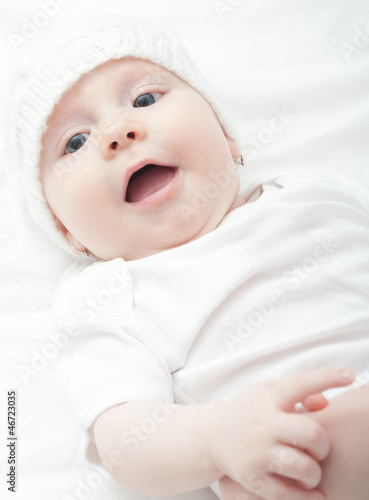 Photo: Baby Girl in Knitted Cap Baby Girl in Knitted Cap