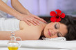 Woman getting a back massage.