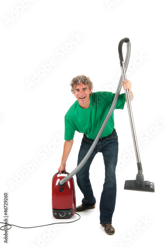 Photo: Man with fun while housekeeping Man with fun while housekeeping
