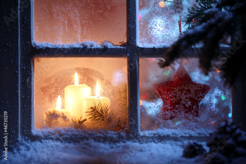 Photo: Frosted window with Christmas decoration Frosted window with Christmas decoration