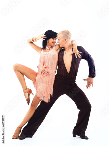 Photo: Elegance Latino dancers in action. isolated on white Elegance Latino dancers in action. isolated on white