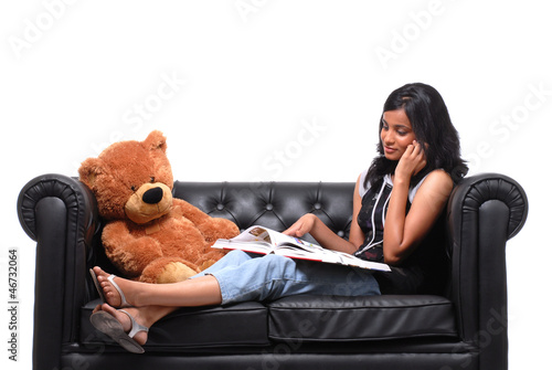 Photo: Girl talking with mobile phone Girl talking with mobile phone