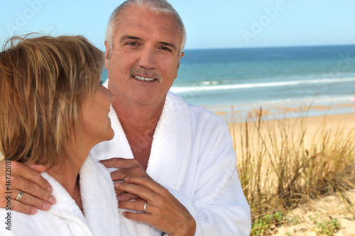 Photo: Couple in sand dunes Couple in sand dunes