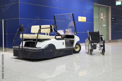 Photo: Wheelchair and buggy in airport Wheelchair and buggy in airport