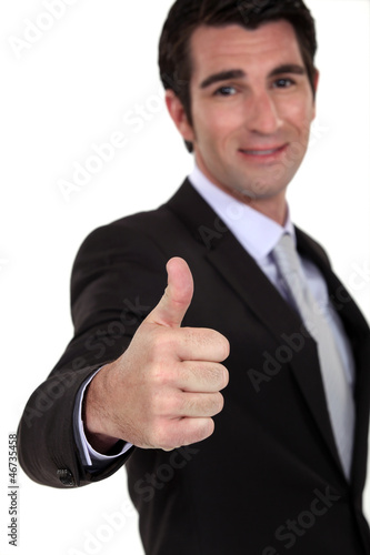 Photo: Thumbs up from a businessman Thumbs up from a businessman
