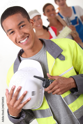 Photo: Four young people illustrating different occupations Four young people illustrating different occupations