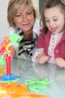 Mother and daughter playing a game