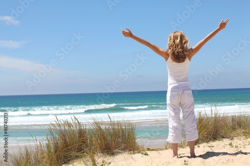 Photo: woman breathing on the beach woman breathing on the beach