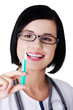 Happy medical doctor or nurse with syringe