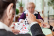 canvas print picture - Drei ältere Damen spielen Karten