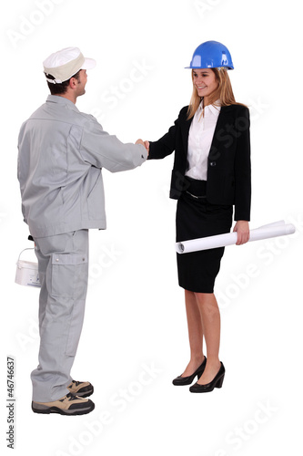 Photo: Architect welcoming decorator Architect welcoming decorator