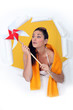 woman holding a windmill toy