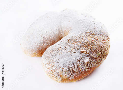 Photo: Freshly baked bun dusted with sugar powder Freshly baked bun dusted with sugar powder