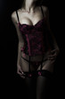 sexy young girl with big breasts in pink black lingerie