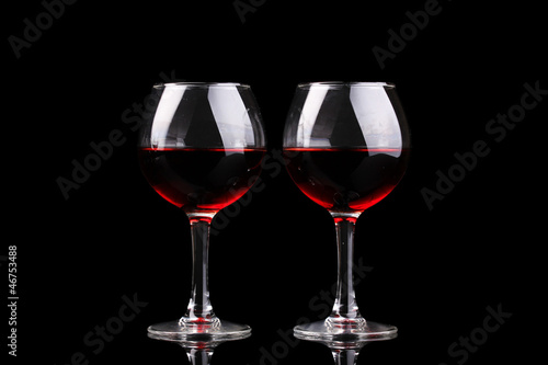 Photo: Wineglasses isolated on black Wineglasses isolated on black