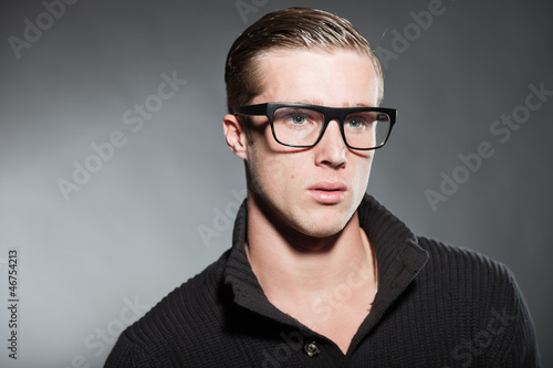 Photo: Fashion beauty portrait of young man with retro glasses. Fashion beauty portrait of young man with retro glasses.