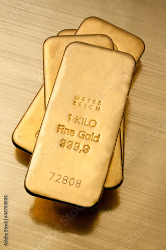 Photo: Geldanlage in echtem Gold als Goldbarren und Goldmünzen Geldanlage in echtem Gold als Goldbarren und Goldmünzen
