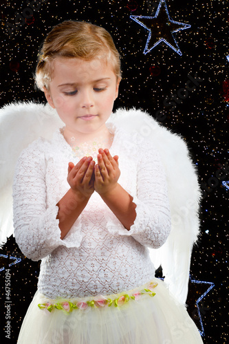 Photo: Christmas miracle - lovely little Angel at Christmas night Christmas miracle - lovely little Angel at Christmas night