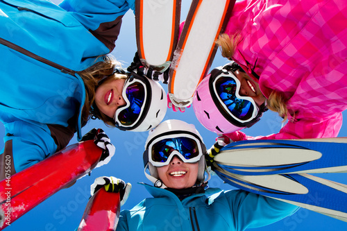 Photo: Ski, snow, sun and winter fun - happy ski team Ski, snow, sun and winter fun - happy ski team
