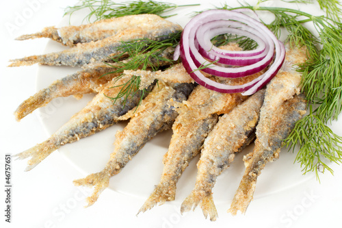 Photo: Roasted and breaded vendace fish on dish Roasted and breaded vendace fish on dish